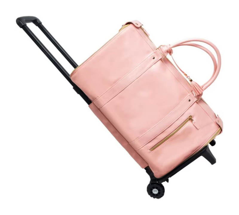 Pink Garment Duffle Roller seated on its telescopic handle and wheels