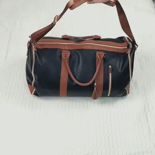 Black Garment Duffle being unfolded, packed and zipped